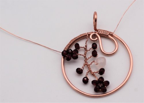 Abby Hook's Jasmine Pendant - Continue to secure, Contemporary Wire Jewelry, Coiling, Coiling Wire, Wire Coiling, Loops, Wire Loop, Wrapped Wire Loop, continue coiling the wire around the frame